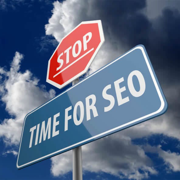 Stop and Time for SEO words on Road Sign